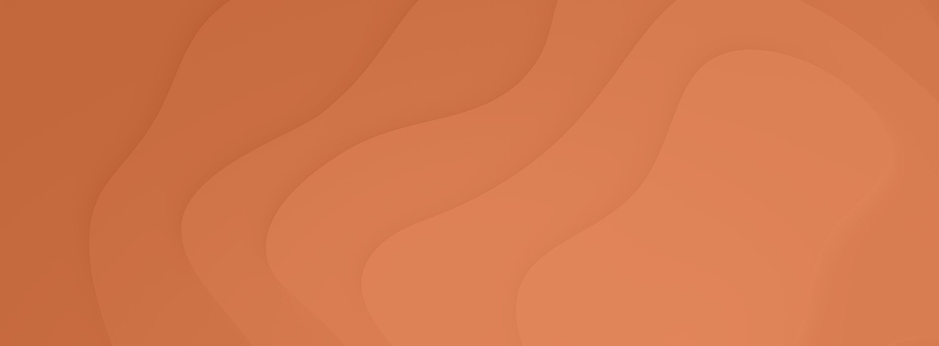 The image displays a close-up of a red ribbon with an abstract design on a grey background.